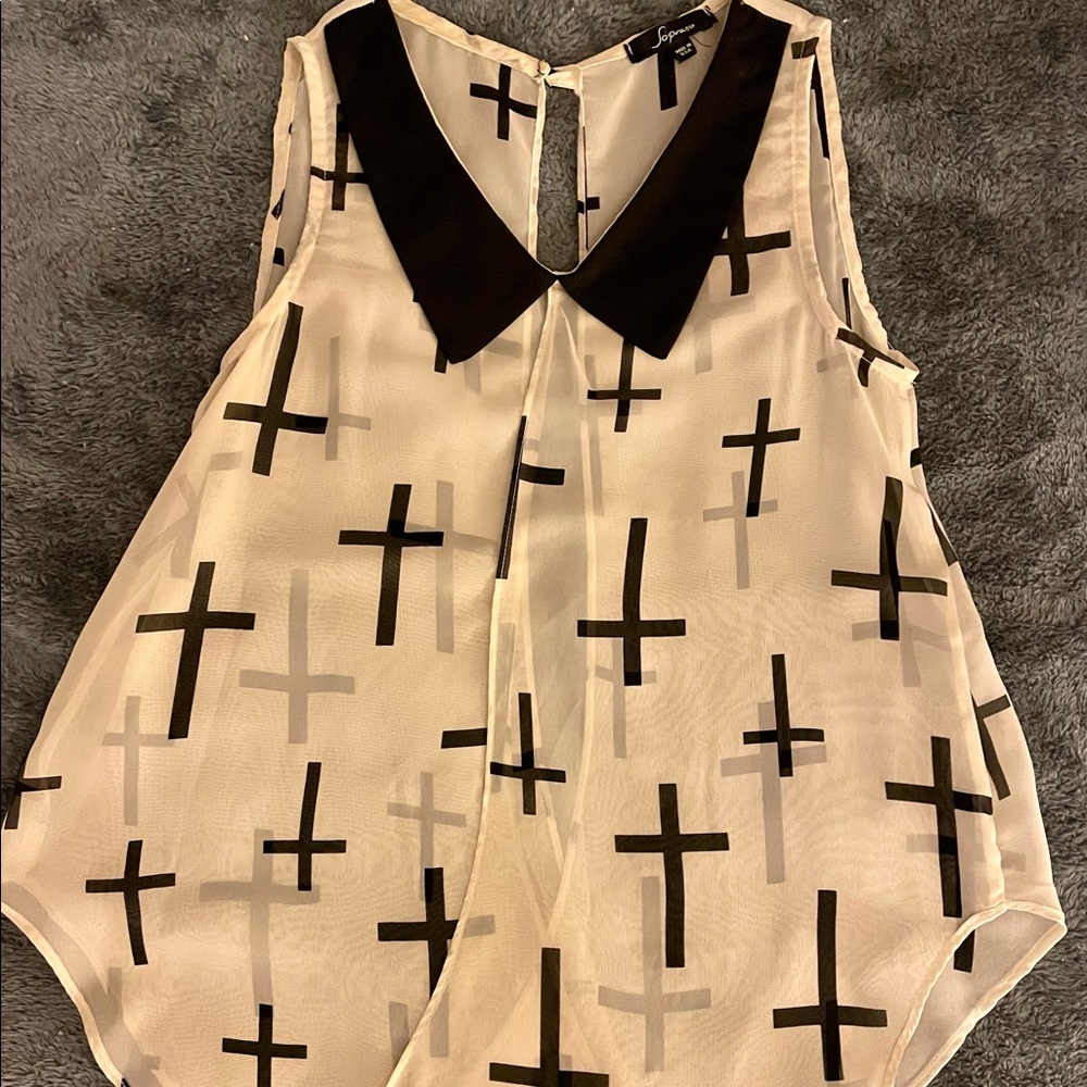 Soprano, sheer white sleeveless shirt with black, cross details. Size small.